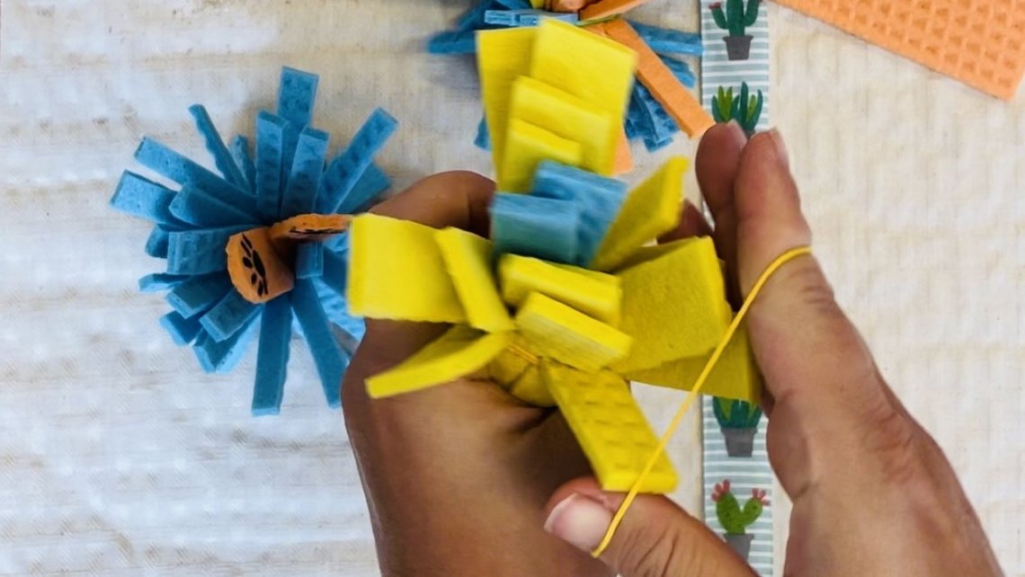 Mit Gummiring fixieren